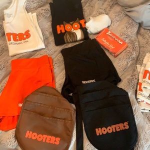 Hooters black shirt, shorts, and pouch